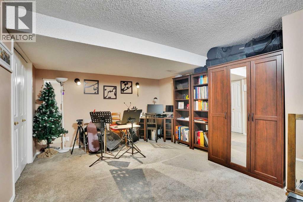 921 Arbour Lake Road NW, Calgary, Alberta  T3G 4S9 - Photo 39 - A2316489