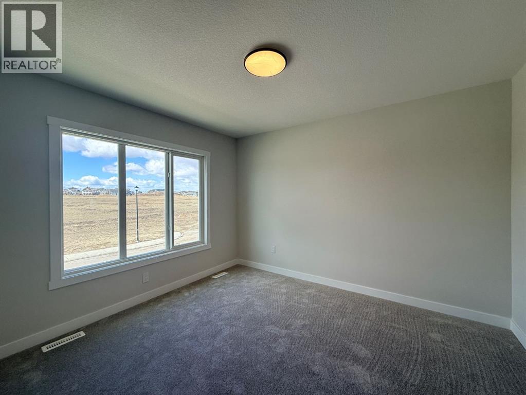 1927 Mccaskill Drive, Crossfield, Alberta  T0M 0S0 - Photo 10 - A2305127