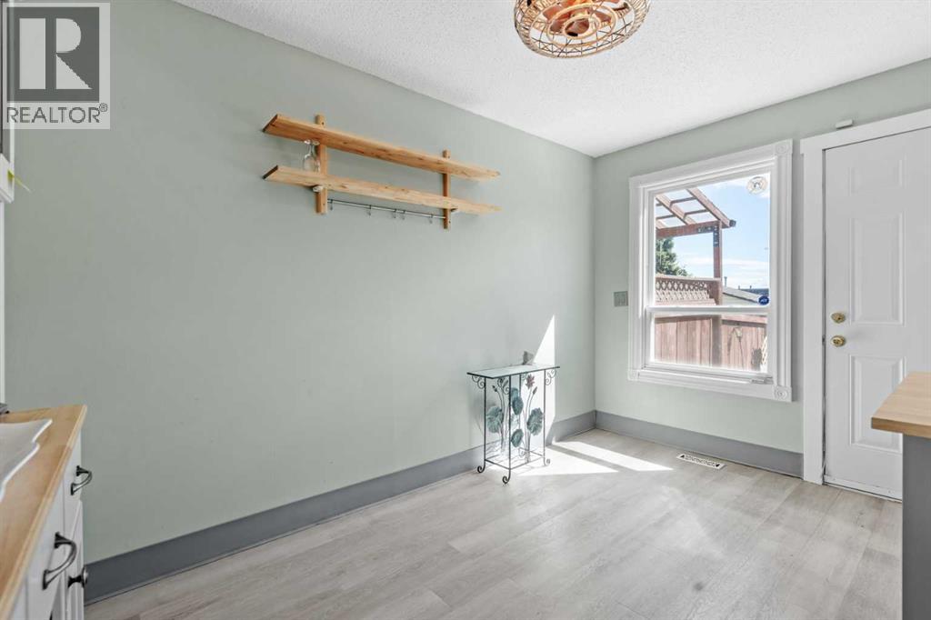 6646 Huntsbay Road NW, Calgary, Alberta  T2K 4R3 - Photo 11 - A2317856