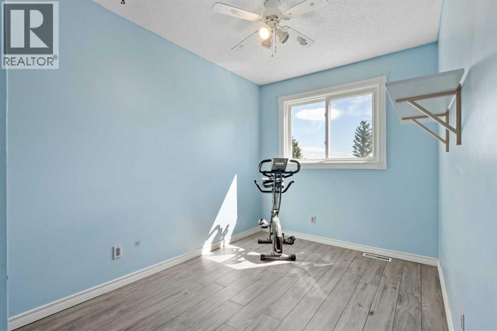6646 Huntsbay Road NW, Calgary, Alberta  T2K 4R3 - Photo 18 - A2317856