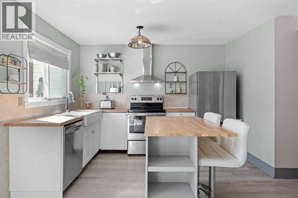 6646 Huntsbay Road NW, Calgary, Alberta  T2K 4R3 - Photo 7 - A2317856