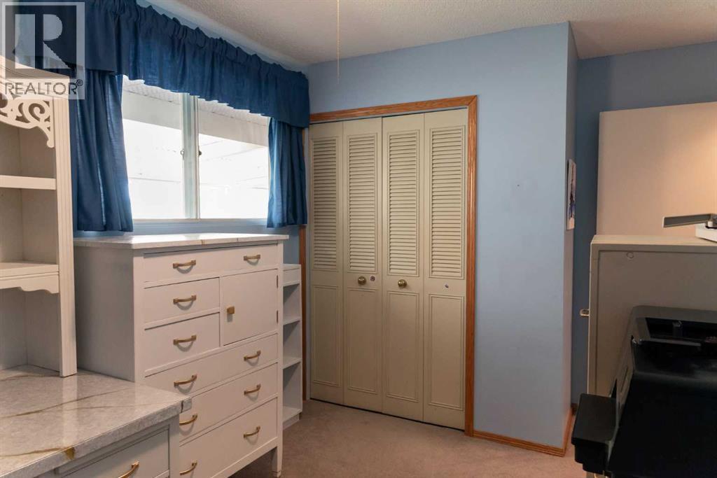 164 Huntford Road NE, Calgary, Alberta  T2K 3Y9 - Photo 17 - A2317475