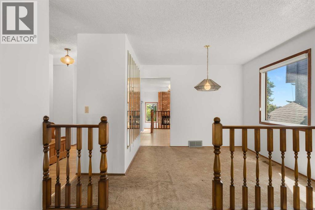 14304 Deer Ridge Drive SE, Calgary, Alberta  T2J 5W1 - Photo 7 - A2321880