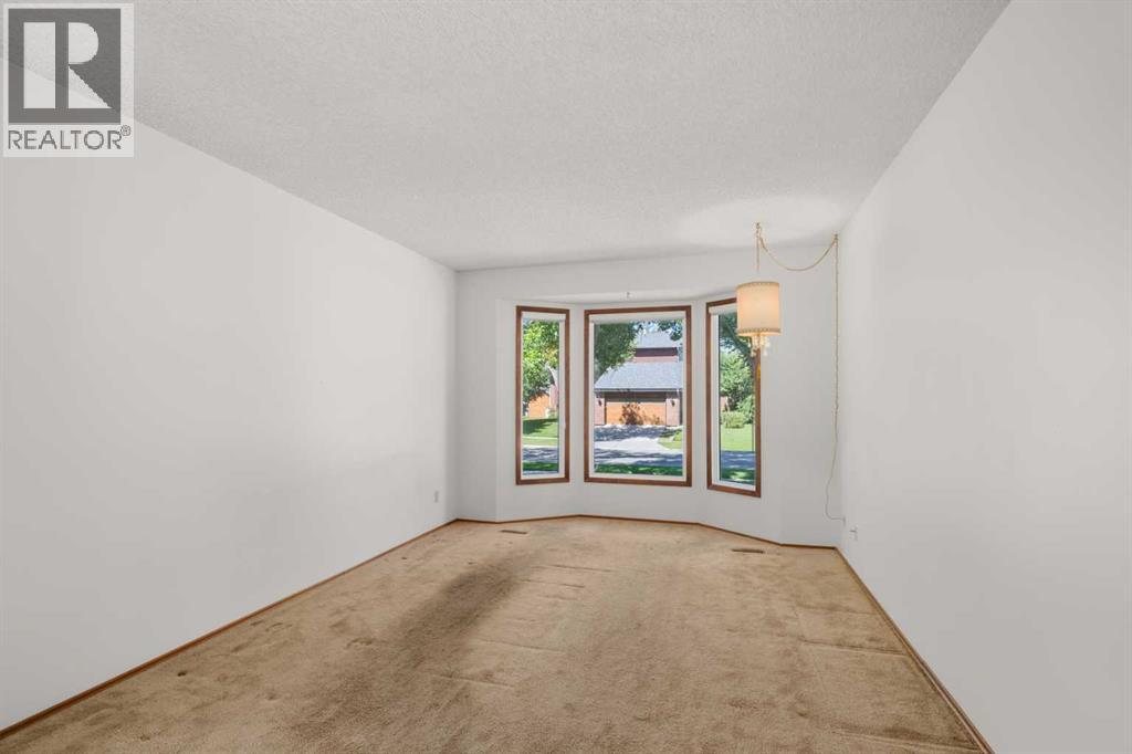 14304 Deer Ridge Drive SE, Calgary, Alberta  T2J 5W1 - Photo 5 - A2321880