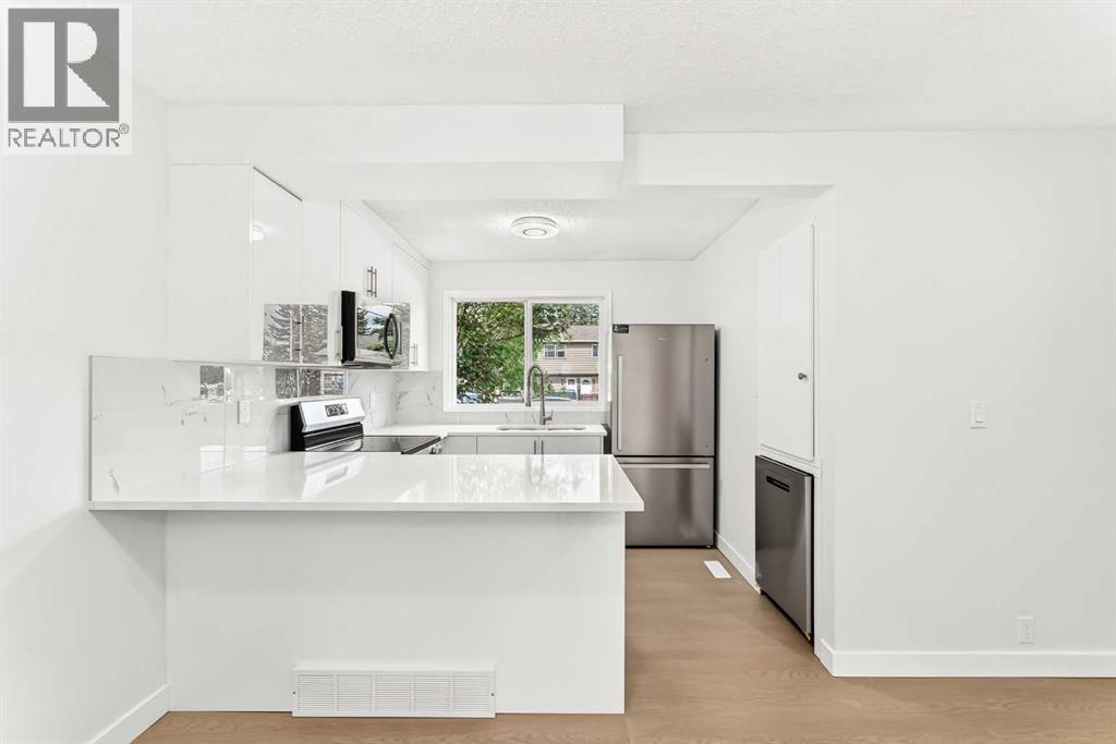 12, 7205 4 Street NE, Calgary, Alberta  T2K 5S3 - Photo 3 - A2322986