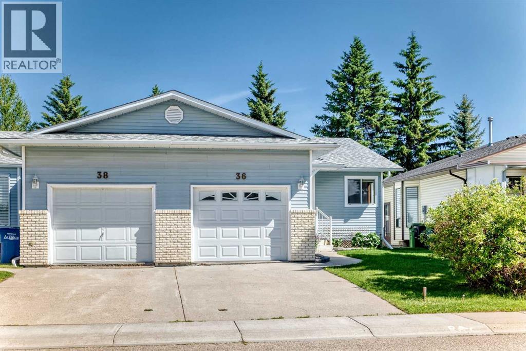 36 Woodside Close NW, Airdrie, Alberta  T4B 2C8 - Photo 2 - A2320041