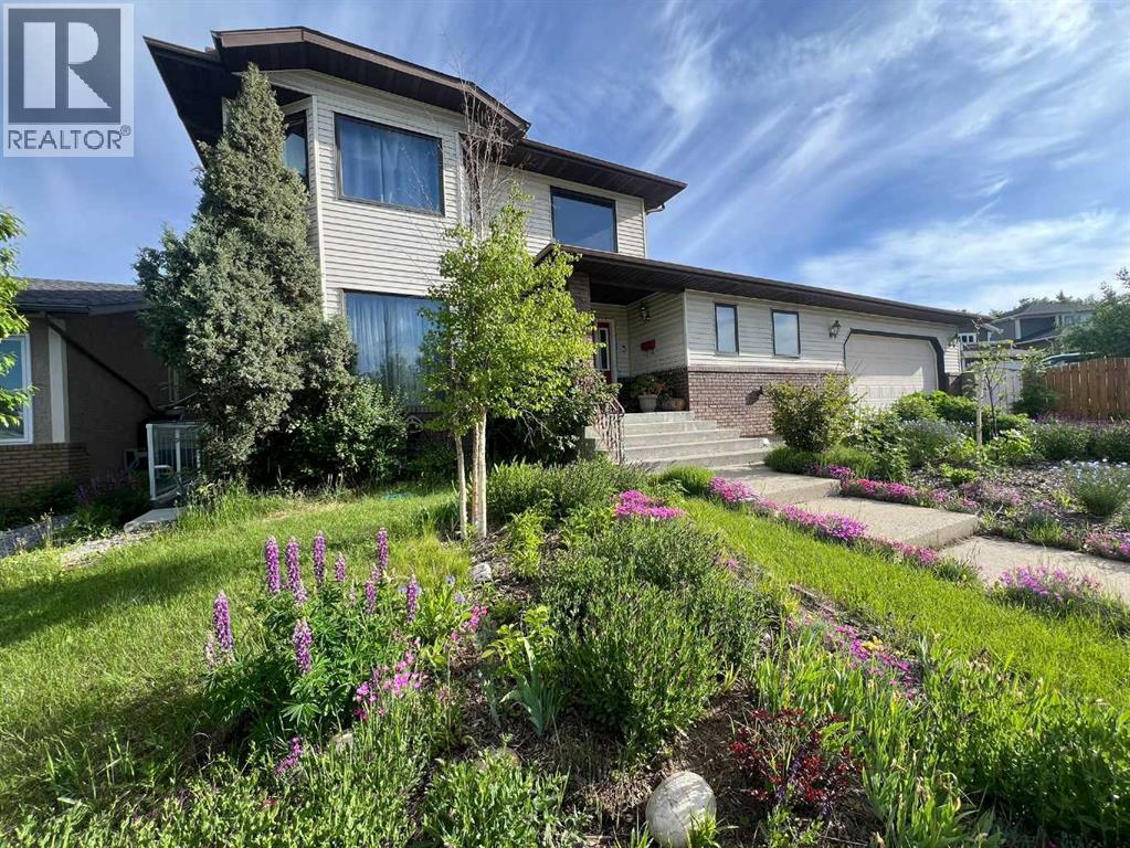 25 Deerfield Manor SE, Calgary, Alberta  T2J 6Z5 - Photo 2 - A2315199