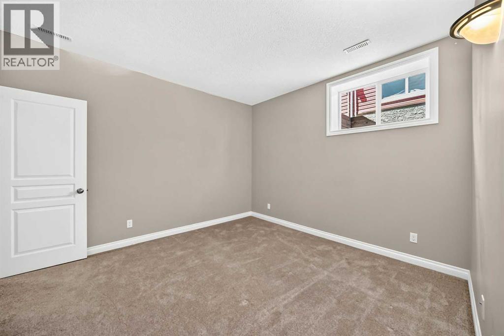 114 Tucker Circle, Okotoks, Alberta  T1S 2J8 - Photo 39 - A2320862