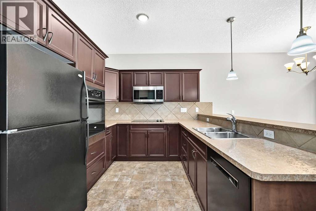 114 Tucker Circle, Okotoks, Alberta  T1S 2J8 - Photo 9 - A2320862