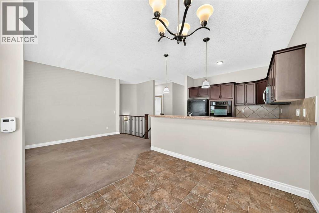 114 Tucker Circle, Okotoks, Alberta  T1S 2J8 - Photo 20 - A2320862