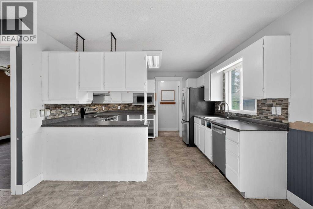 504 1 Avenue NE, Airdrie, Alberta  T4B 1R1 - Photo 9 - A2318619
