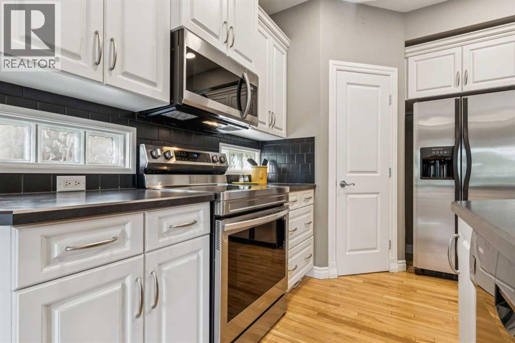 58 Cougar Plateau Way SW, Calgary, Alberta  T3H 5S5 - Photo 8 - A2322134