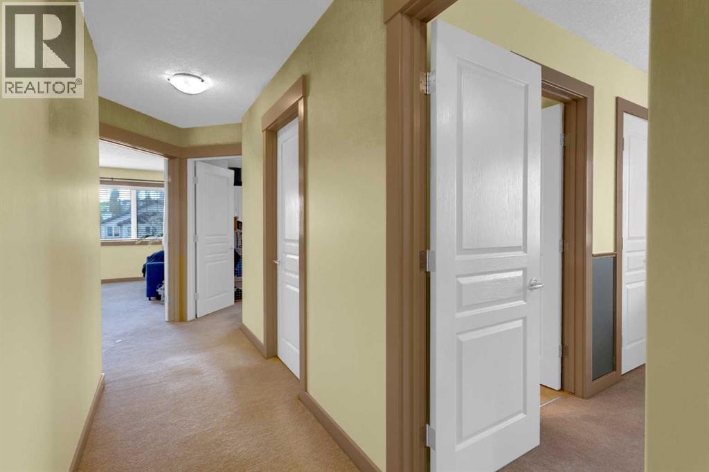 8 Elmont Court Sw, Calgary, Alberta  T3H 5Z8 - Photo 22 - A2314670
