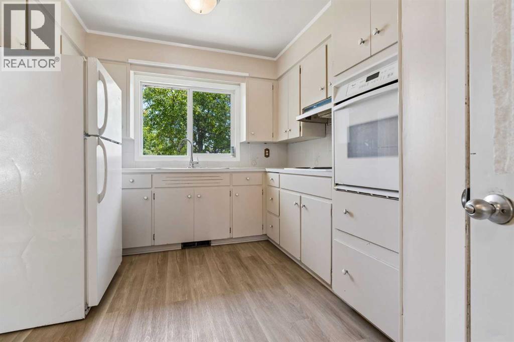 1306 87 Avenue SW, Calgary, Alberta  T2V 0W3 - Photo 7 - A2321347