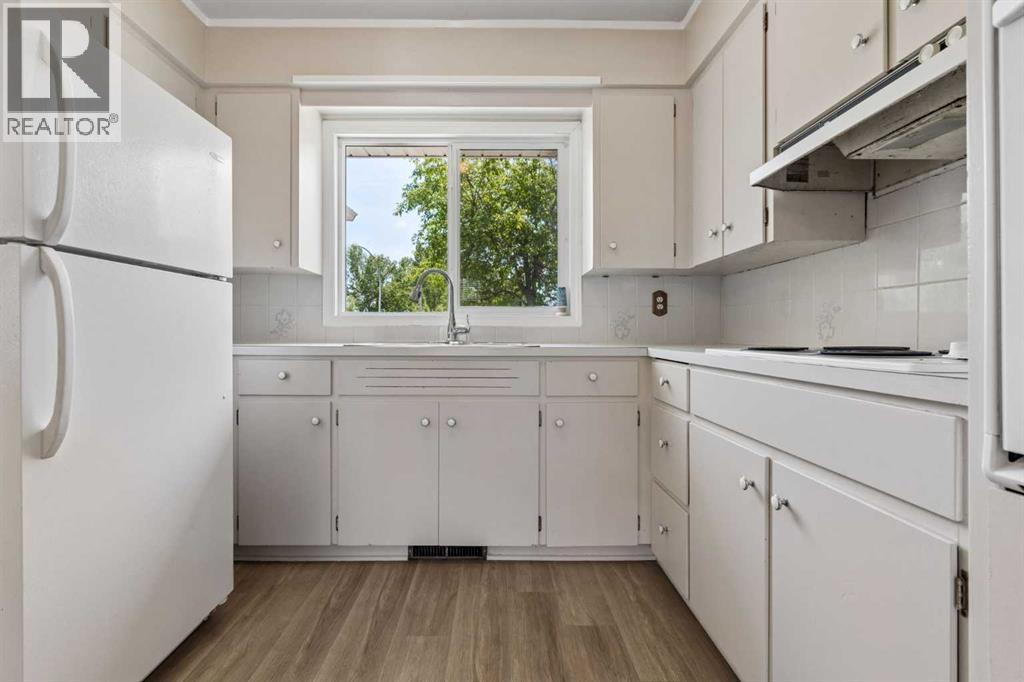 1306 87 Avenue SW, Calgary, Alberta  T2V 0W3 - Photo 8 - A2321347