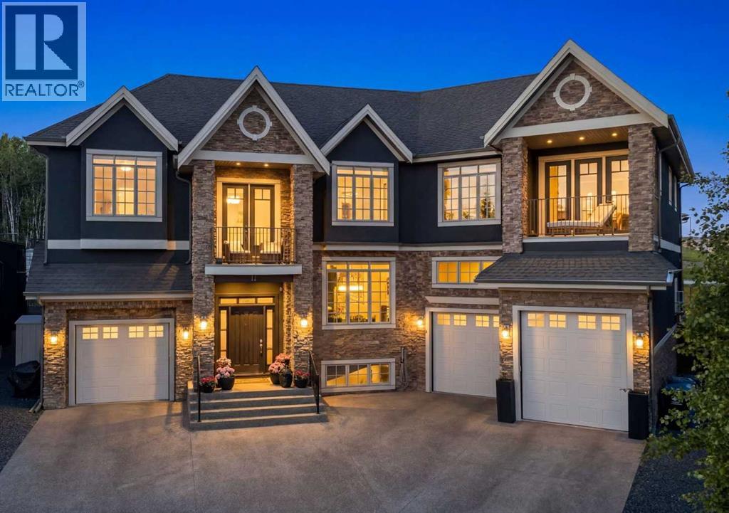 11 Elveden Place SW, Calgary, Alberta  T3H 0L1 - Photo 1 - A2322987