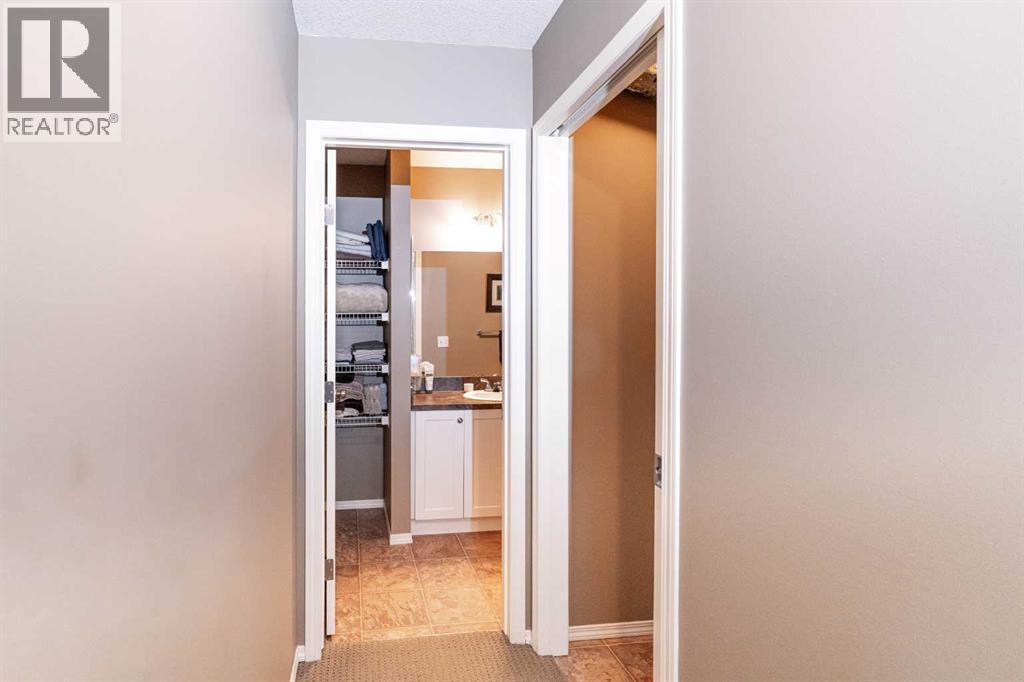 203, 11 Panatella Landing NW, Calgary, Alberta  T3K 0K8 - Photo 27 - A2319198