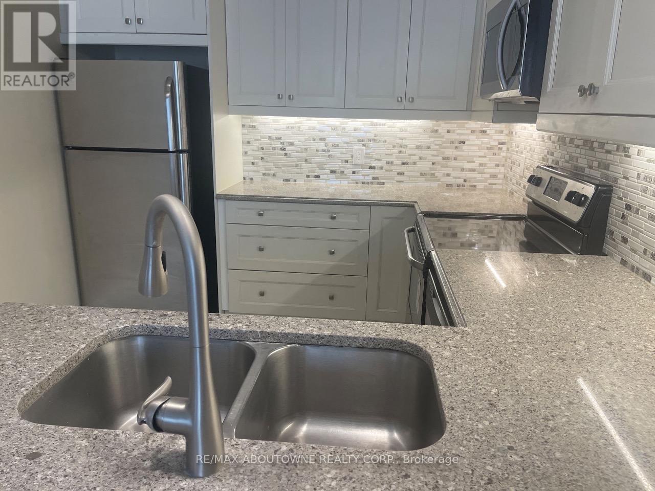 101 - 276 Gatwick Drive, Oakville, Ontario  L6H 0K8 - Photo 7 - W13472882