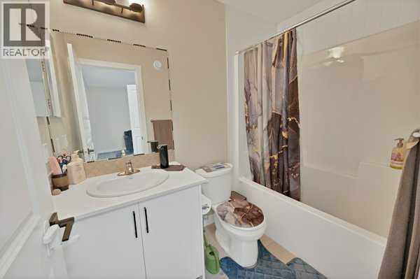 241 Midgrove Mews Sw, Airdrie, Alberta  T4B 5K8 - Photo 11 - A2322840