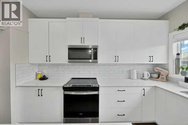 241 Midgrove Mews Sw, Airdrie, Alberta  T4B 5K8 - Photo 28 - A2322840