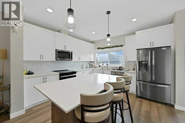241 Midgrove Mews Sw, Airdrie, Alberta  T4B 5K8 - Photo 5 - A2322840