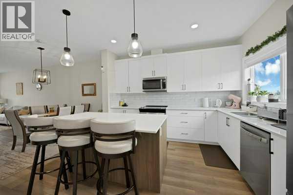 241 Midgrove Mews Sw, Airdrie, Alberta  T4B 5K8 - Photo 6 - A2322840