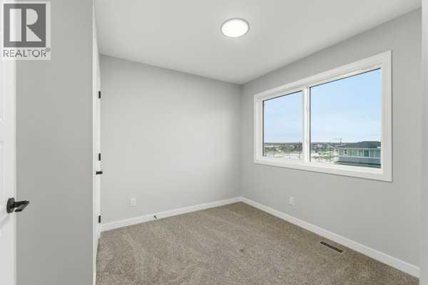 2161 Bayview Drive SW, Airdrie, Alberta  T4B 5N3 - Photo 29 - A2294623