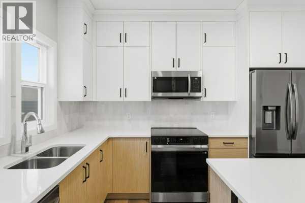 2161 Bayview Drive SW, Airdrie, Alberta  T4B 5N3 - Photo 11 - A2294623
