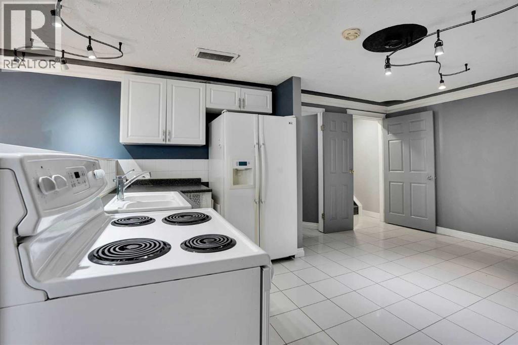 1527 Maitland Drive NE, Calgary, Alberta  T2A 5V2 - Photo 34 - A2321382