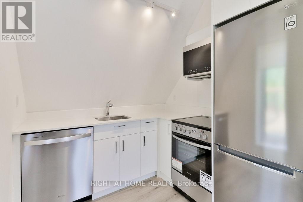 3 - 45 Brock Avenue, Toronto, Ontario M6K 2K9 - Photo 5 - W13477056