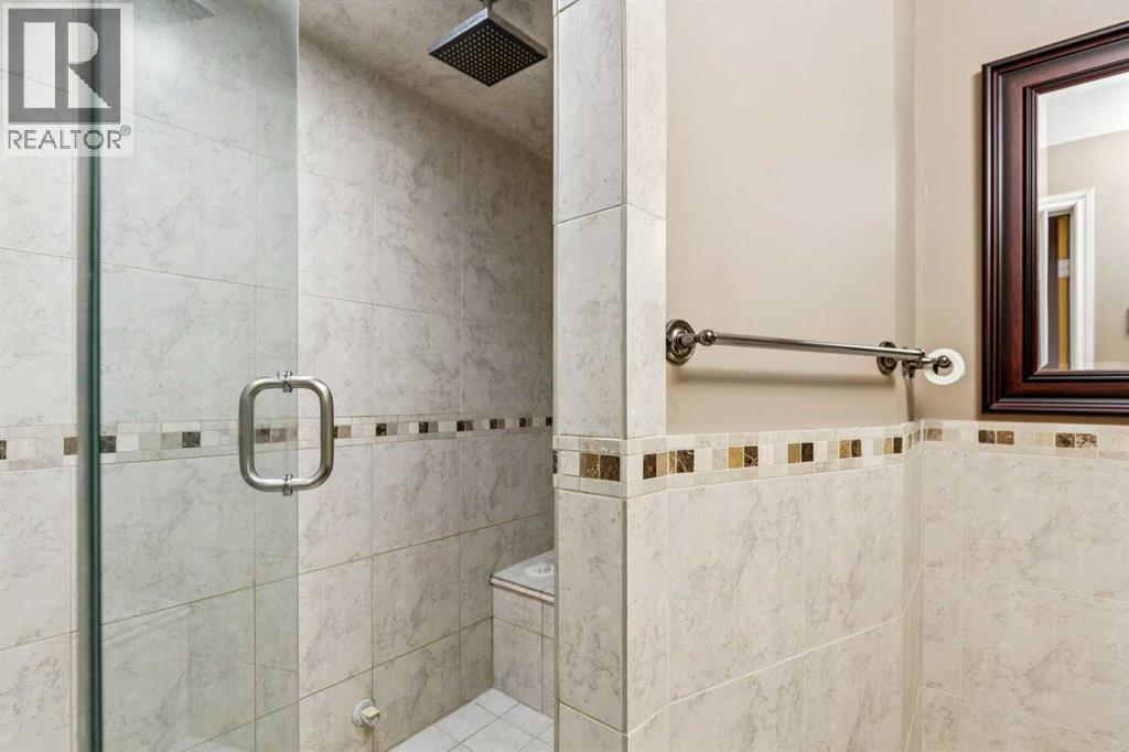 27 Valley Creek Bay NW, Calgary, Alberta  T3B 5V3 - Photo 35 - A2323276