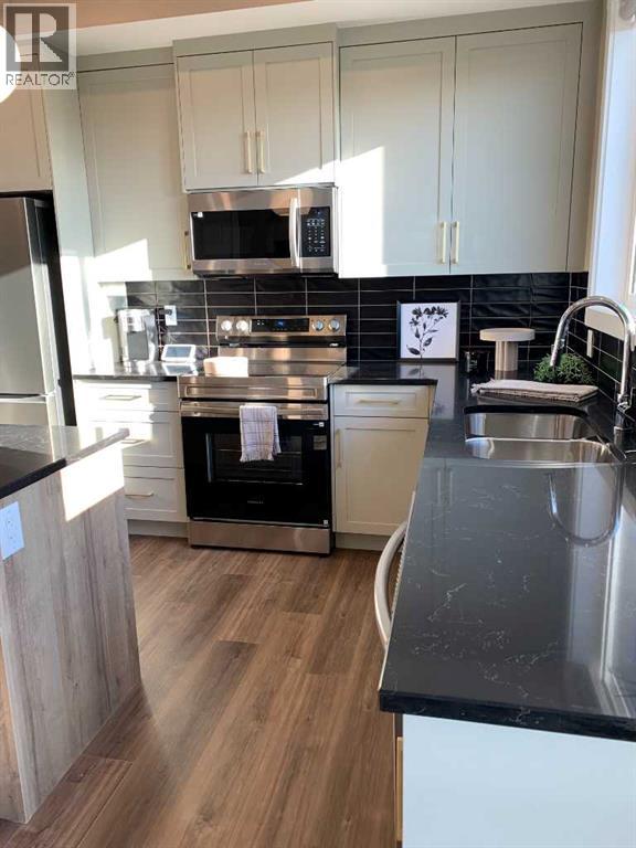 135 Ambleridge Street Nw, Calgary, Alberta  T3P 3H2 - Photo 3 - A2304455
