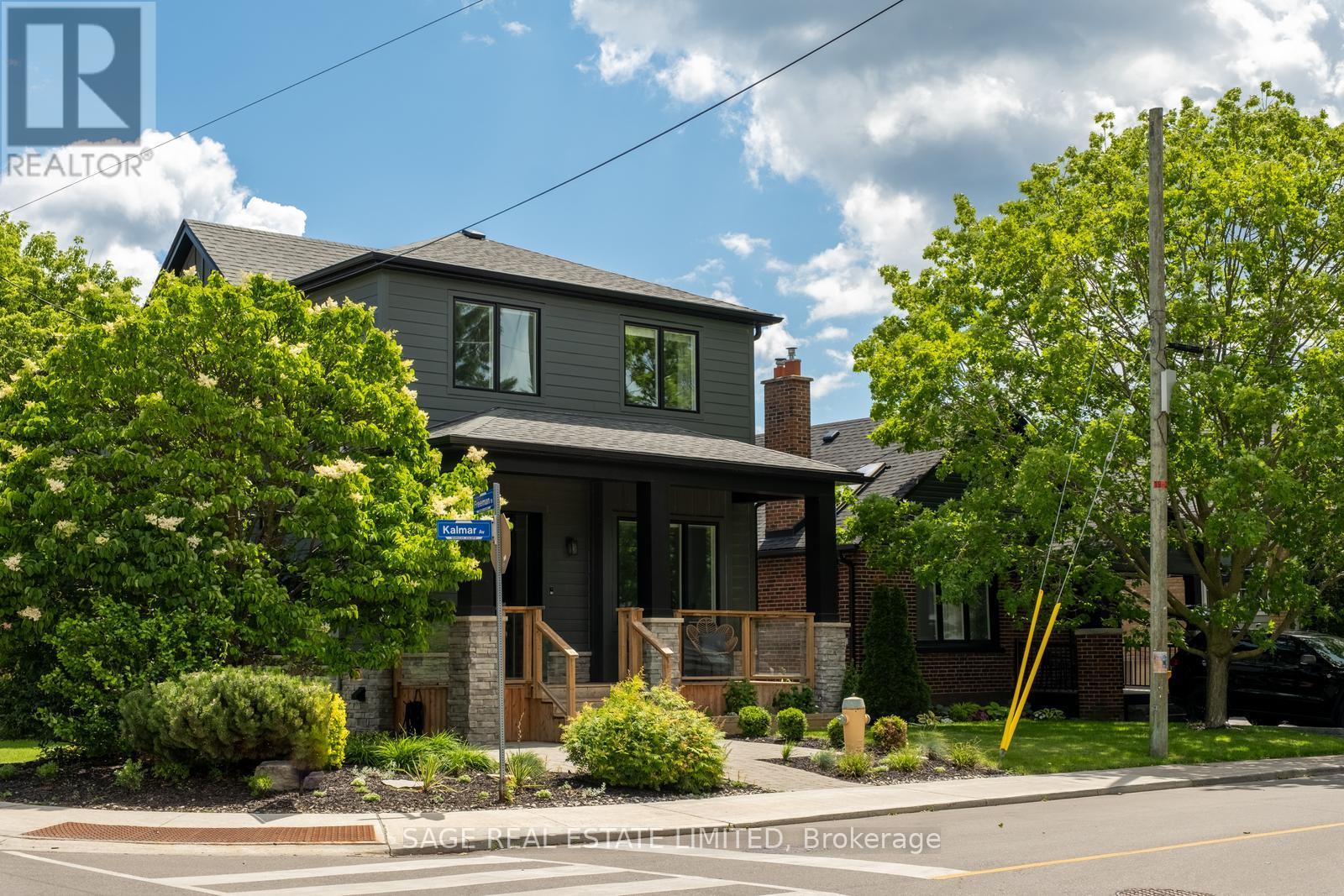 <div class="slider-price">$1,729,000</div><p>59 Kalmar Avenue, Toronto, Ontario</p>