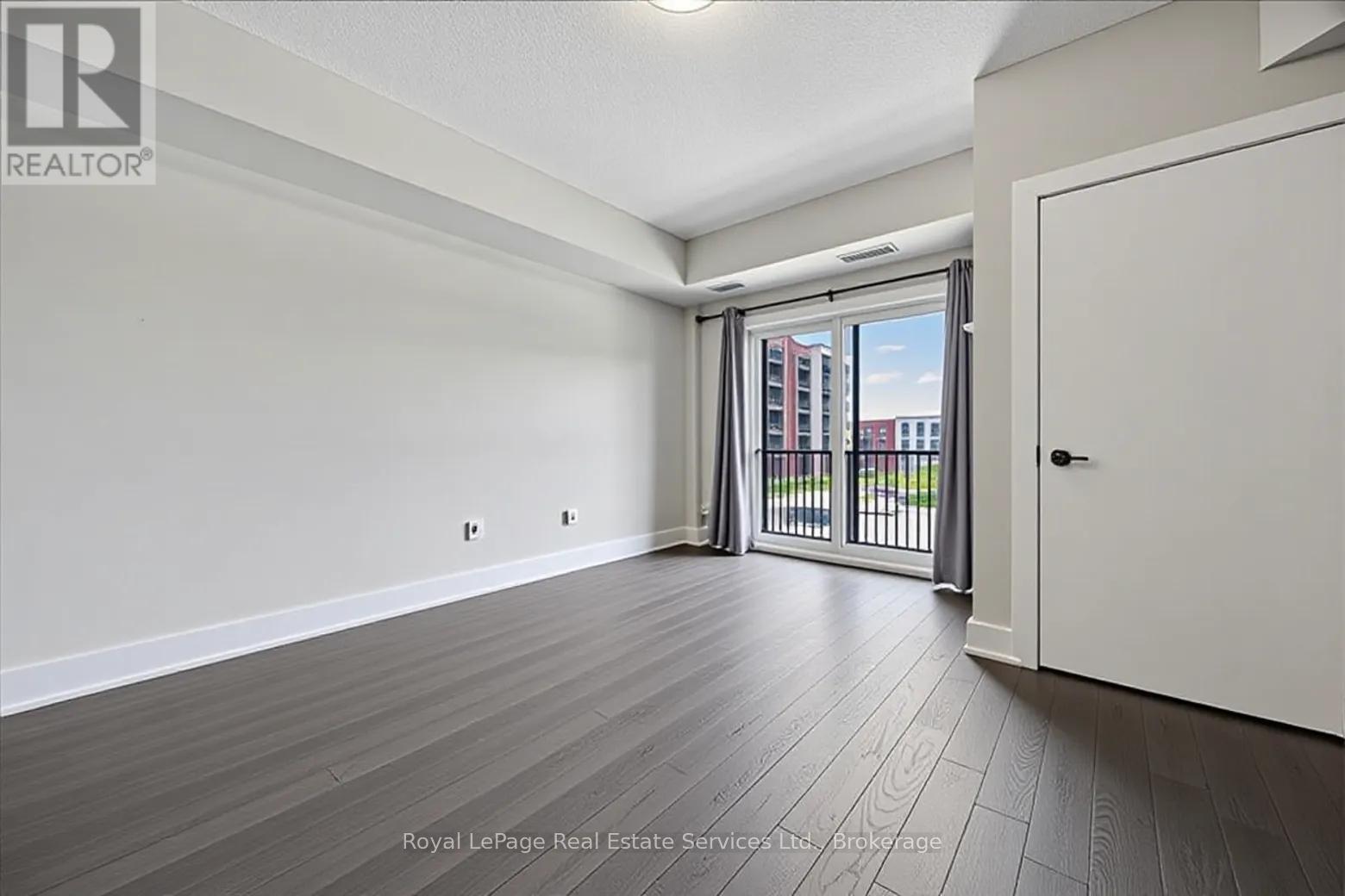 209 - 6 Spice Way, Barrie, Ontario  L9J 0J9 - Photo 7 - S13476806