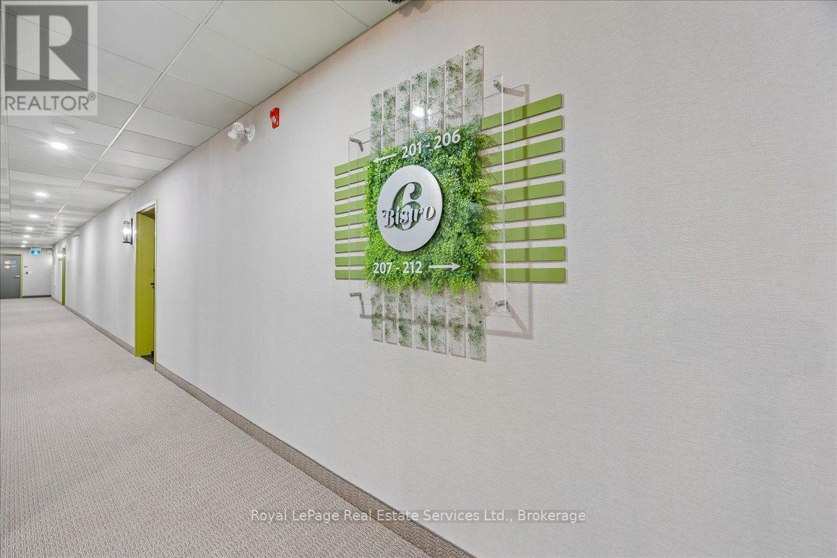 209 - 6 Spice Way, Barrie, Ontario  L9J 0J9 - Photo 2 - S13476806