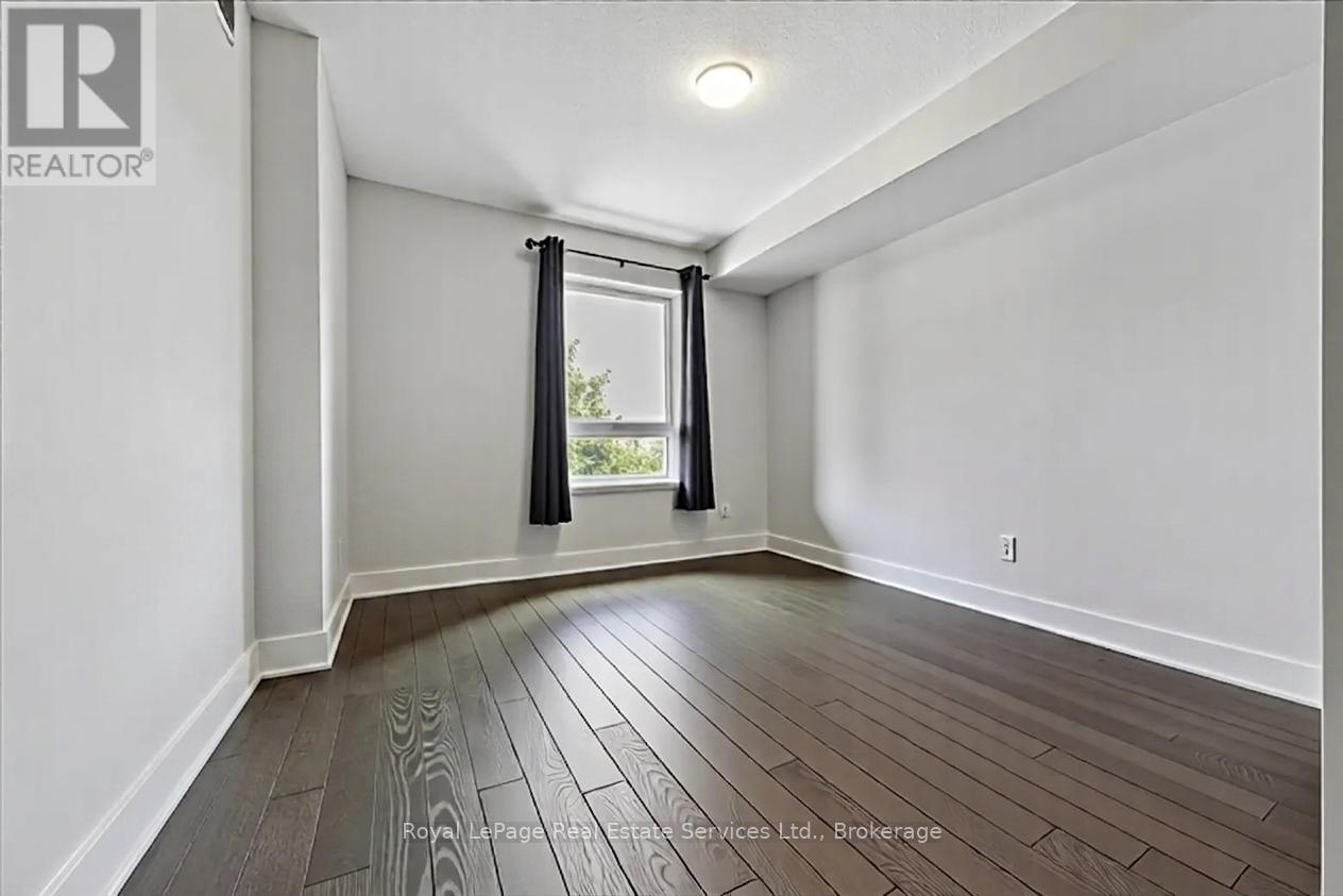 209 - 6 Spice Way, Barrie, Ontario  L9J 0J9 - Photo 10 - S13476806