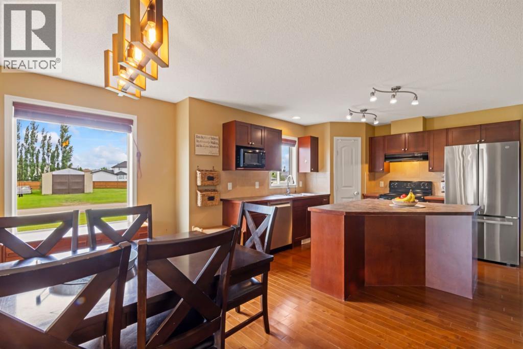 303 Railway Point SE, Langdon, Alberta  T0J 1X1 - Photo 9 - A2320725