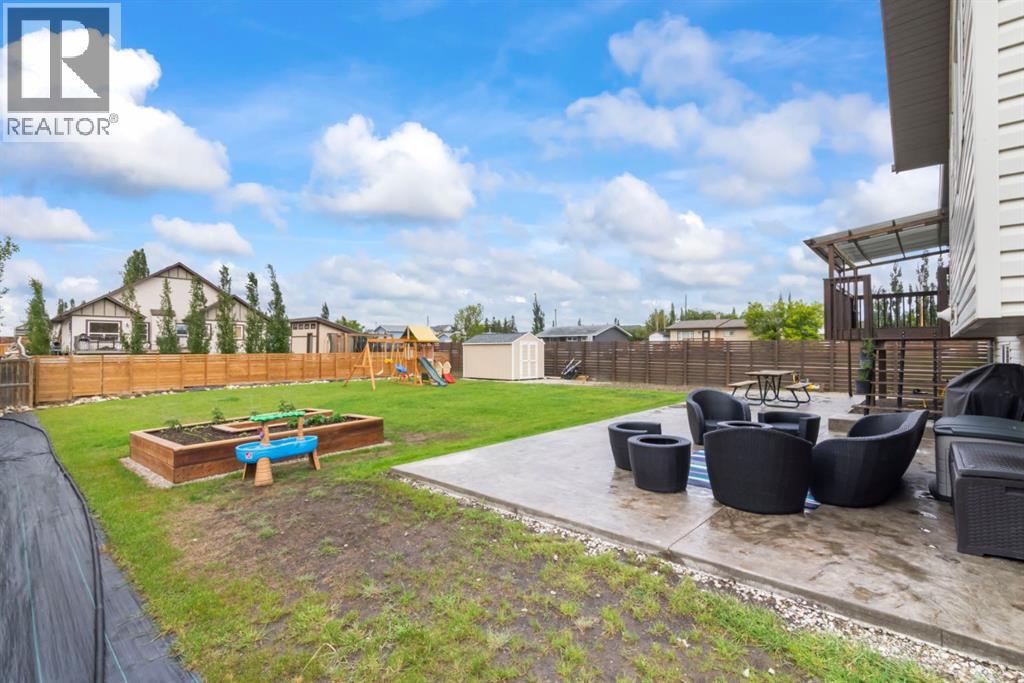 303 Railway Point SE, Langdon, Alberta  T0J 1X1 - Photo 2 - A2320725