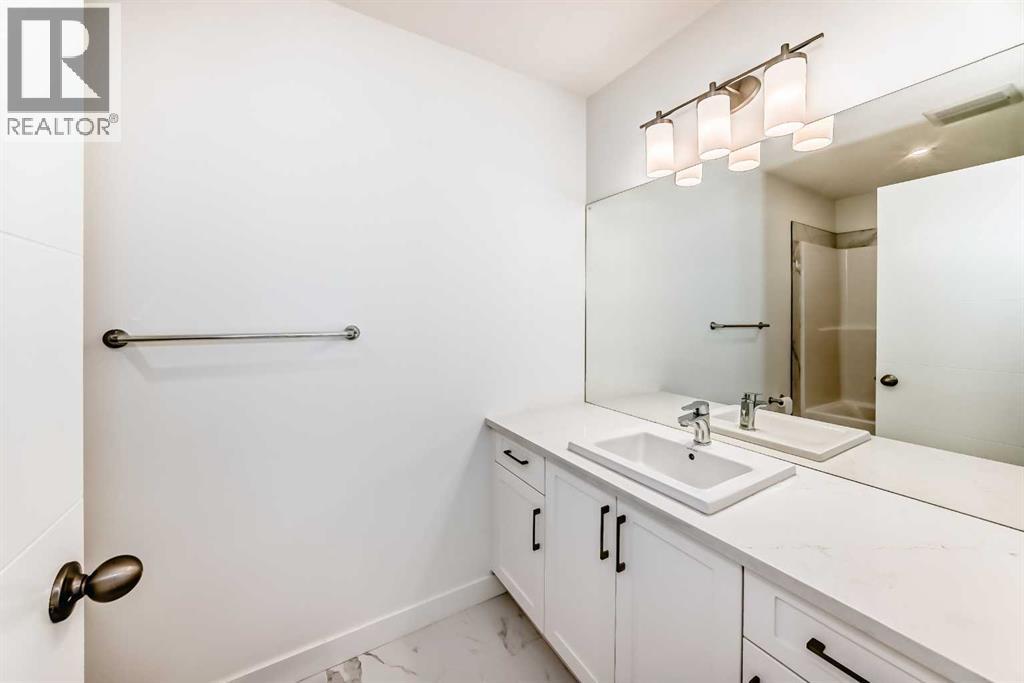53 Spring Creek Common Sw, Calgary, Alberta  T3H 6E2 - Photo 31 - A2318931