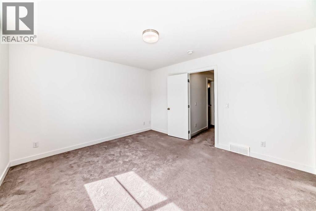 53 Spring Creek Common Sw, Calgary, Alberta  T3H 6E2 - Photo 22 - A2318931