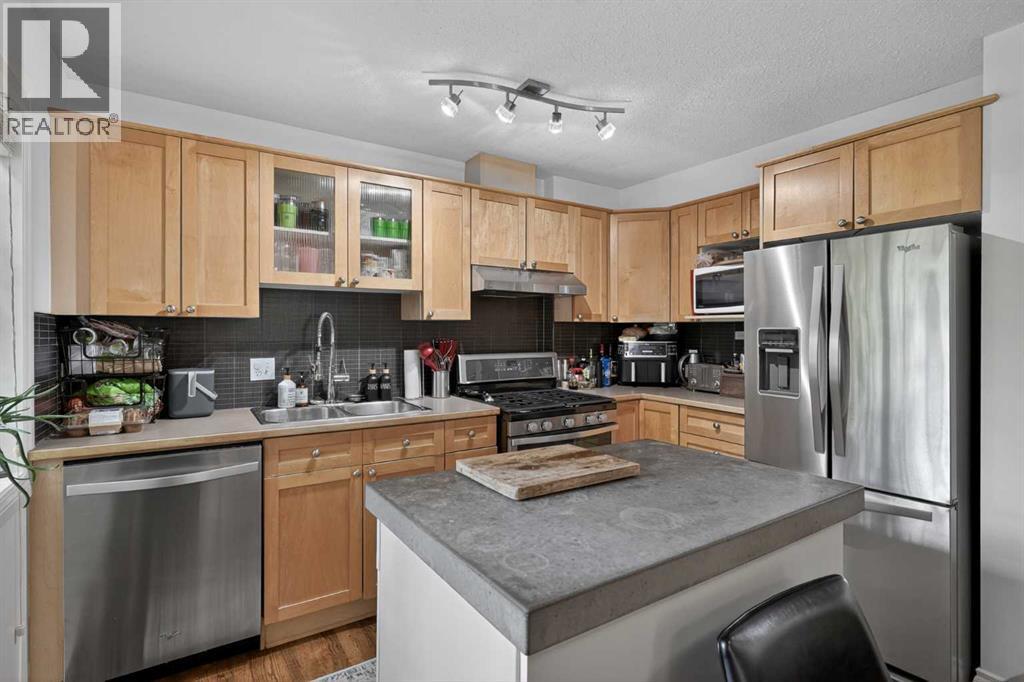 4421 Quentin Court Sw, Calgary, Alberta  T2T 6B8 - Photo 5 - A2320563