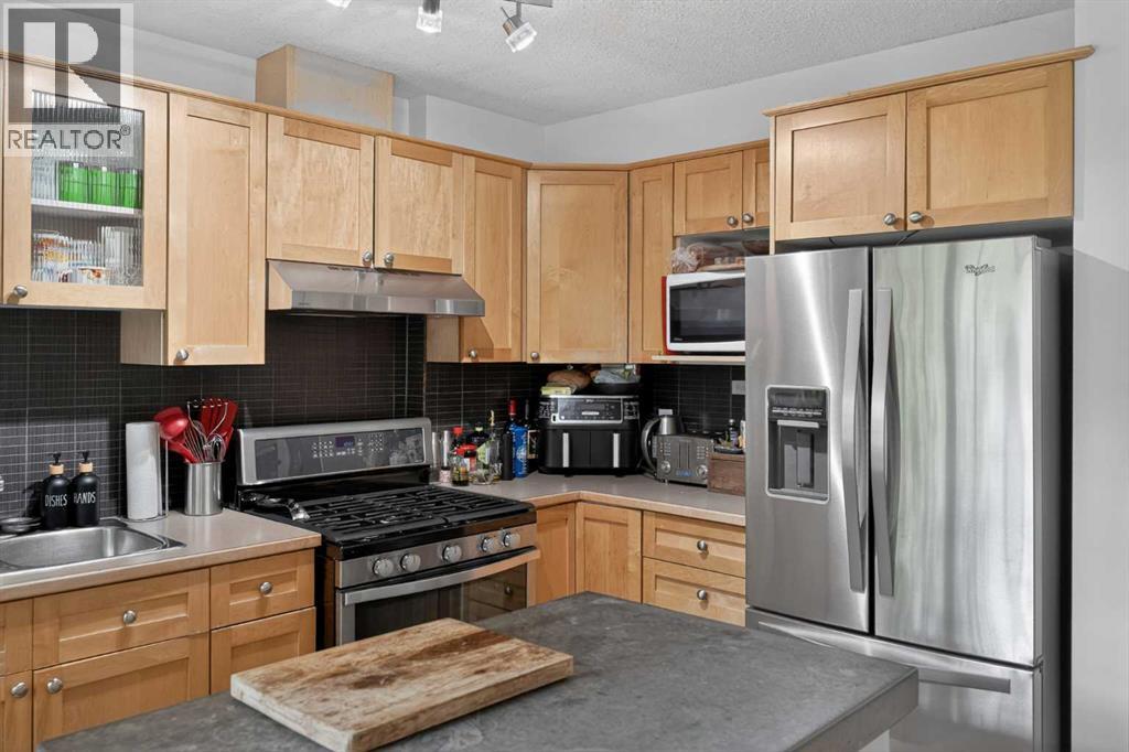 4421 Quentin Court Sw, Calgary, Alberta  T2T 6B8 - Photo 6 - A2320563