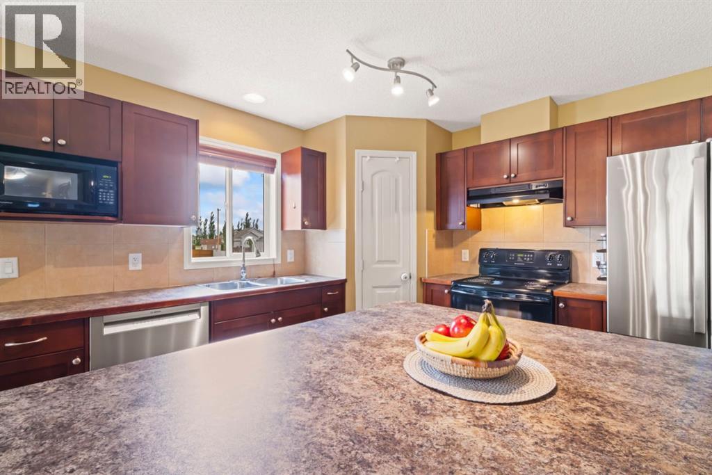 303 Railway Point Se, Langdon, Alberta  T0J 1X1 - Photo 10 - A2320725