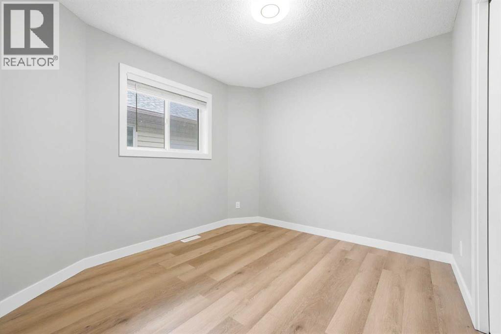 115 Coverdale Way Ne, Calgary, Alberta  T3K 4J5 - Photo 16 - A2317740