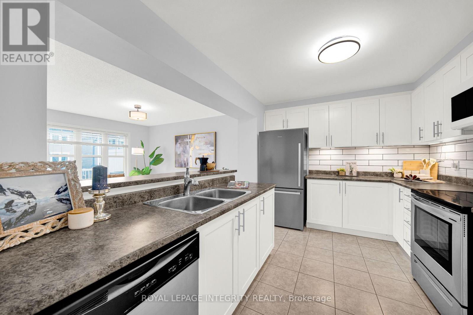 311 Pumpkinseed Crescent, Ottawa, Ontario K2J 6J9 - Photo 6 - X13481456
