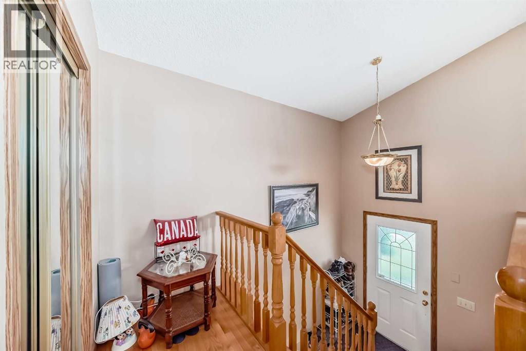 27 Covepark Drive NE, Calgary, Alberta  T3K 5T6 - Photo 4 - A2318996