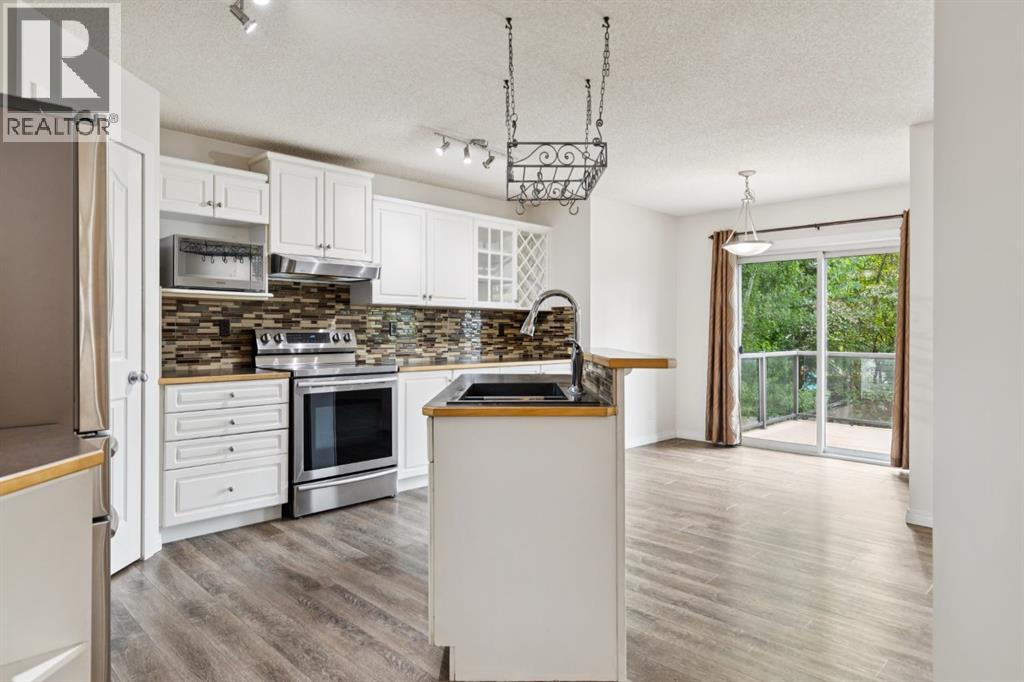 26 Spring Mews SW, Calgary, Alberta  T3H 3V1 - Photo 12 - A2323200