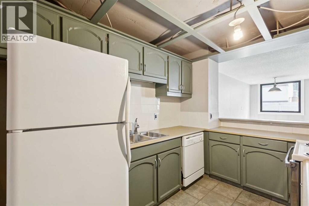 703, 215 14 Avenue SW, Calgary, Alberta  T2R 0M2 - Photo 5 - A2323301