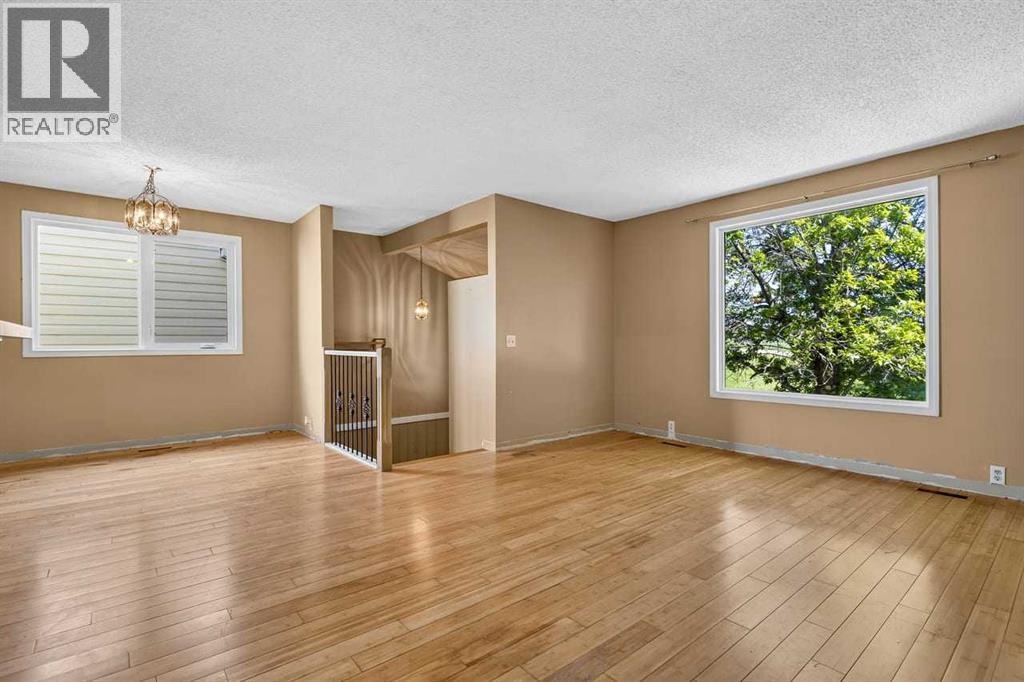 130 Woodbrook Way SW, Calgary, Alberta  T2W 4R6 - Photo 6 - A2321860