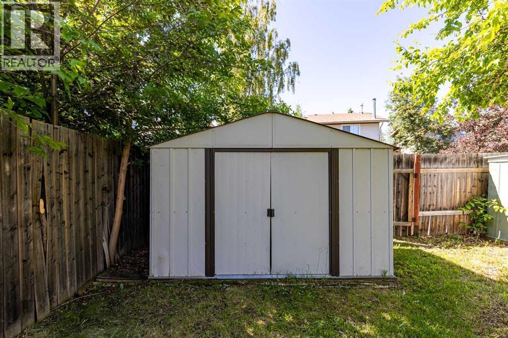 130 Woodbrook Way SW, Calgary, Alberta  T2W 4R6 - Photo 36 - A2321860